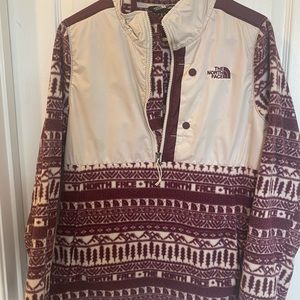 For sale - one North Face three-quarter zipped sweater.